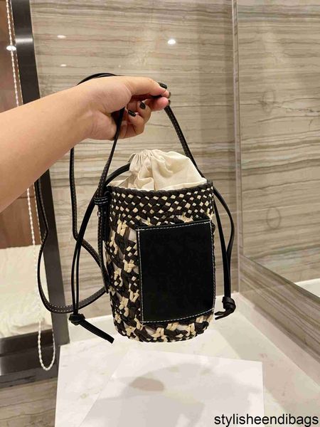 

luxury designer women's fashion drawstring pocket mini bucket summer beach straw small hollow out handbags shoulder bags phone bag styl