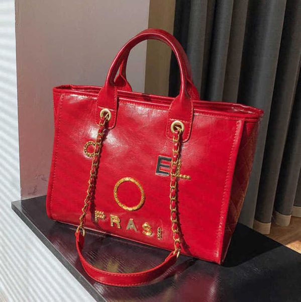 

women's luxury fashion hand bags beach bag brand metal badge classic totes handbags small mini pearl handbag female capacity large leat
