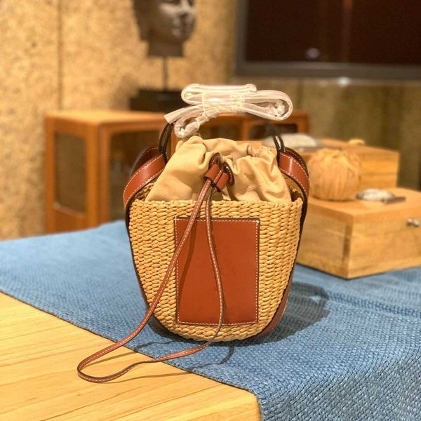 

designer woven bag french crossbody handbag small bucket art shoulder into shop leather piece patchwork papyrus beach bag