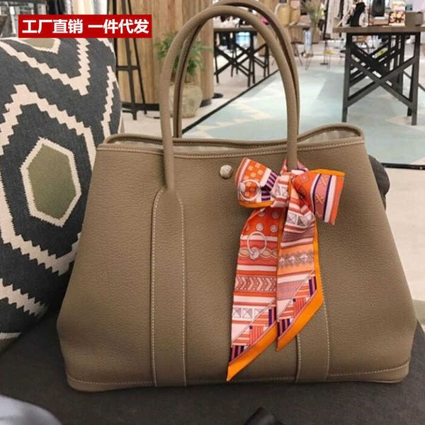 

original designer bags h home 2023 garden baotou layer litchi cow leather togo commuter fashion versatile handbag large capacity women'