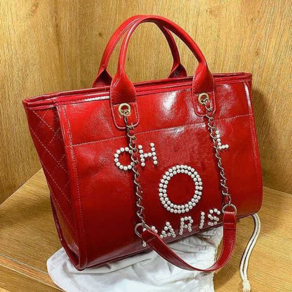 

fashion women's luxury hand bags beach bag brand metal badge classic totes handbags small mini pearl handbag female capacity large leat