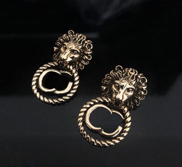 

french vintage classic women earring lion head shaped stud hollow letter solid color studs hip hop punk brass earrings4063416