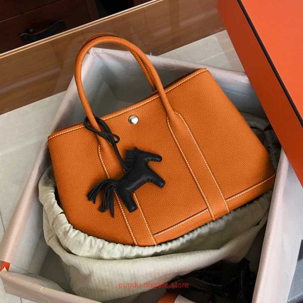 

original h home tote bags wholesale autumn and winter 2023 new lychee grain cowhide garden bag large capacity leather female portable buck h