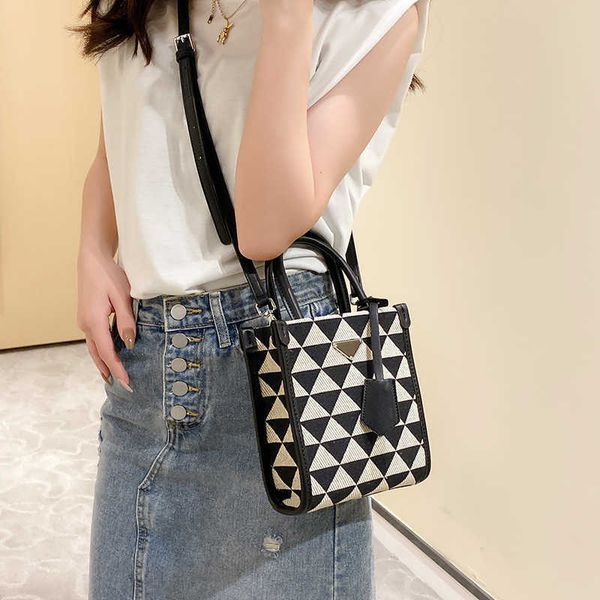 

new fashion women's bag triangle check mini tote bag portable canvas small bag advanced sense killer bag
