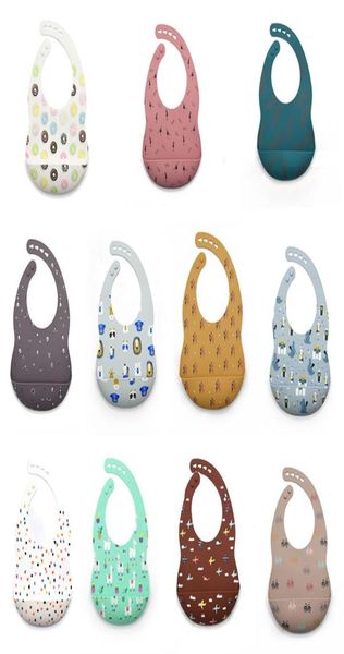 

50pcslot 17 styles silicone bib printed animal ship leaves carton waterproof baby feeding aprons adjustable bibs burp m31339885711