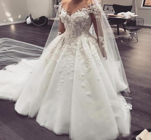 

2020 luxury a line wedding dresses sheer neck lace 3d floral appliques tulle long sleeves back plus size court train bridal g7268150, White