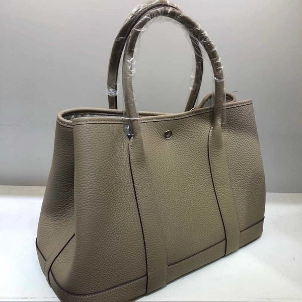 

original designer bags h home layer lychee grain cowhide leather shoulder strap 25 30 36cm garden bag portable messenger lady 0e6k
