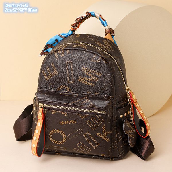

wholesale ladies shoulder bag 3 colors sweet little fresh pendant student backpacks street personality rivet backpack elegant atmosphere rib