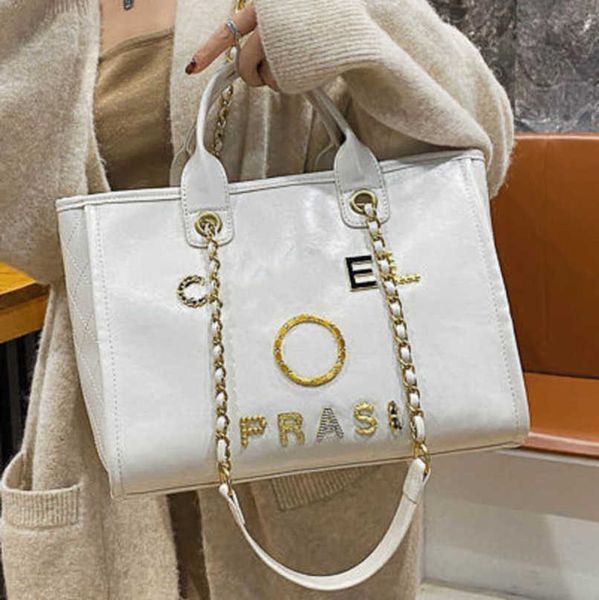 

women's luxury fashion hand bags beach bag brand metal badge classic totes handbags small mini pearl handbag female capacity large leat