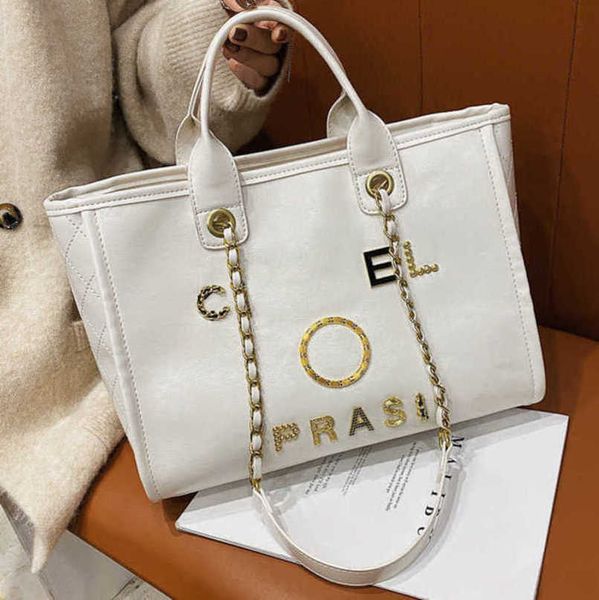 

luxury women's fashion hand bags beach bag brand metal badge classic totes handbags small mini pearl handbag female capacity large leat
