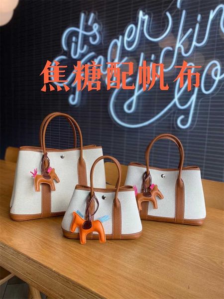 

original designer bags h home new genuine 2023 leather women's bag garden canvas with layer cowhide fashion handheld one shoulder cross
