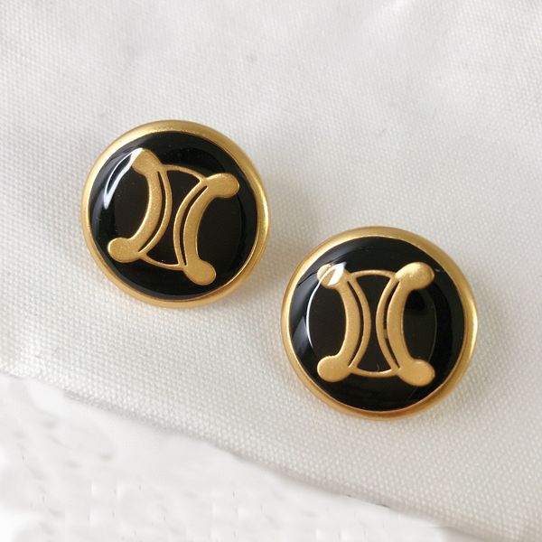 

2023 round shape stud earring with black color design have stamp ps7231b, Golden