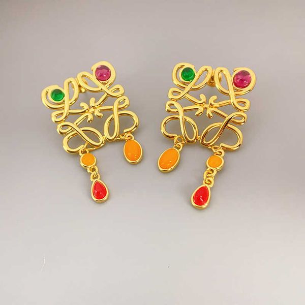 

Designer Earrings loews Luxury jewelry top accessories Abstract Chinese Lion Dance Element Hollow out with Diamonds 925 Silver Needle Earrings Christmas gift