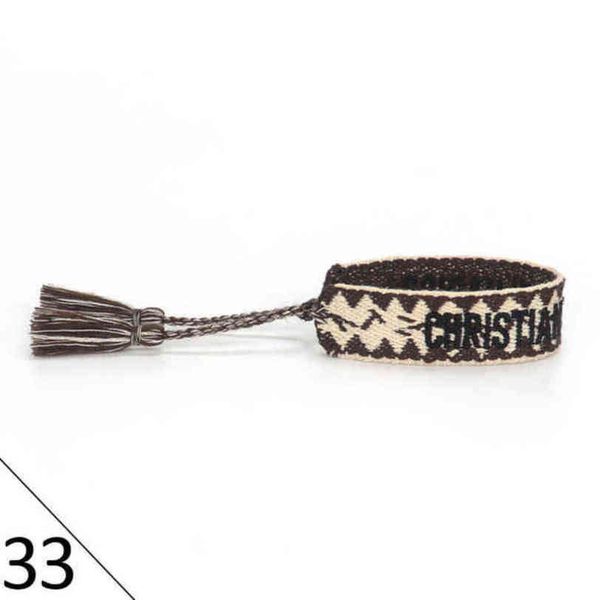 

fashion designers wovens friendship bracelet for luxury brand handmade braided bracelets with tassel print embroidery men bangle code 20-38, Golden;silver