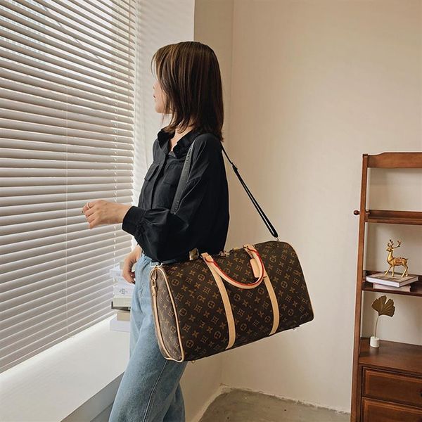 

double g duffle bag duffel bags luggages travelling handbags women large capacity luggage bag baggage waterproof handbag c333n