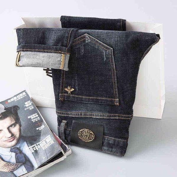 

and autumn winter stretch men's dark blue jeans fashion brand slim fit small feet washed medium waist pants
