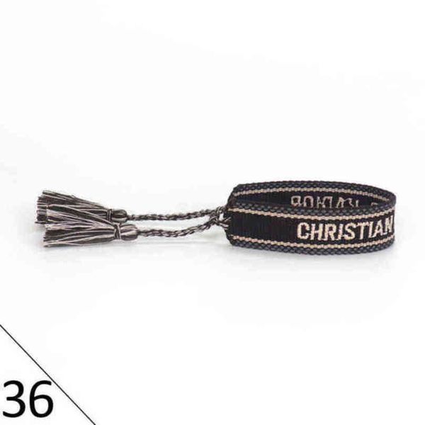 

fashion designers wovens friendship bracelet for luxury brand handmade braided bracelets with tassel print embroidery men bangle code 20-38, Golden;silver
