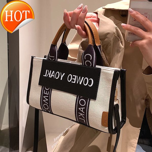

designer bags large capacity canvas female 2022 new type cloth small group hand-held class commuting tote messenger