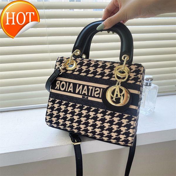 

new designer handbagswomen's bag 2022 new fashion temperament printed handbag texture letter one shoulder messenger bag