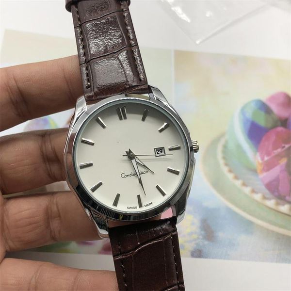 

2022 stylish simple men's watch high-quality three-pin 42mm diameter circular metal panel displays calendar, Slivery;brown