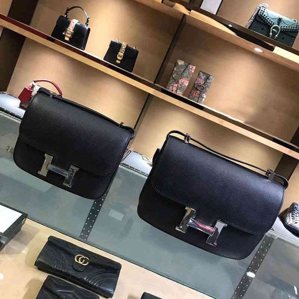 

leather 2022 new stewardess bag one shoulder ten font women's button small square fashion classic trend