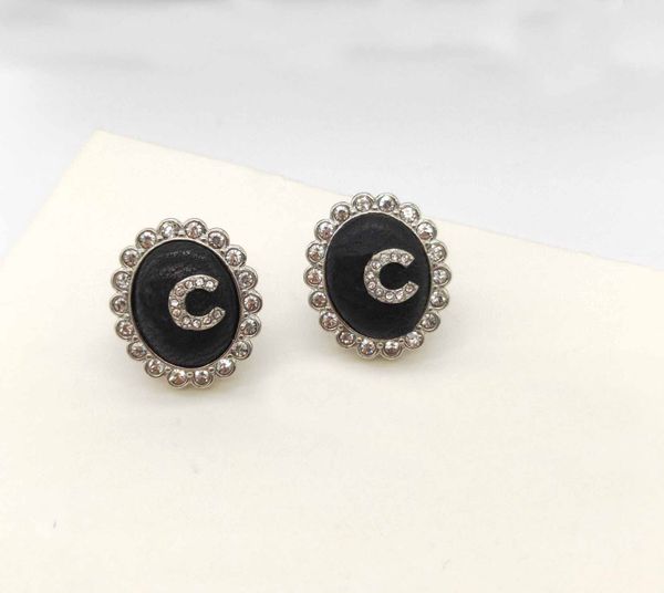 

2022 charm oval shape stud earring with black geuine leather have box stamp ps7151a, Golden