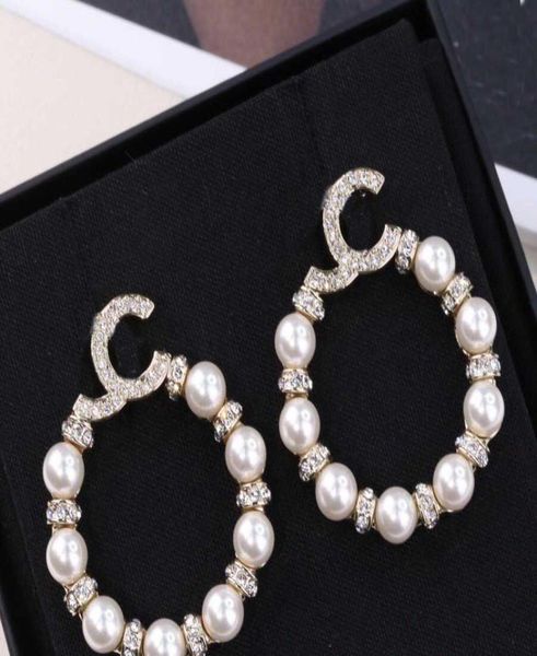 

2022 luxury quality drop charm stud earring with white nature pearl and dia, Golden