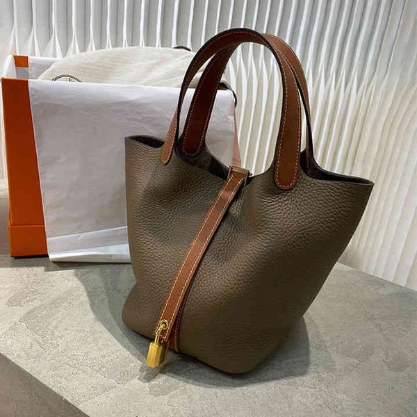 

2022 new small dish basket bag hand-held head layer cowhide bucket leather women's open woman
