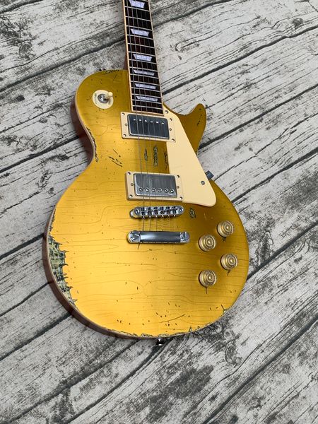 

ged/relic nitro finish electric guitar gold one piece body and neck frets binding