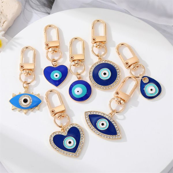 

s3203 fashion jewelry enamel evil eye pendant key ring for man woman geometric rhinestone heart eyelashes blue eyes keychain, Slivery;golden