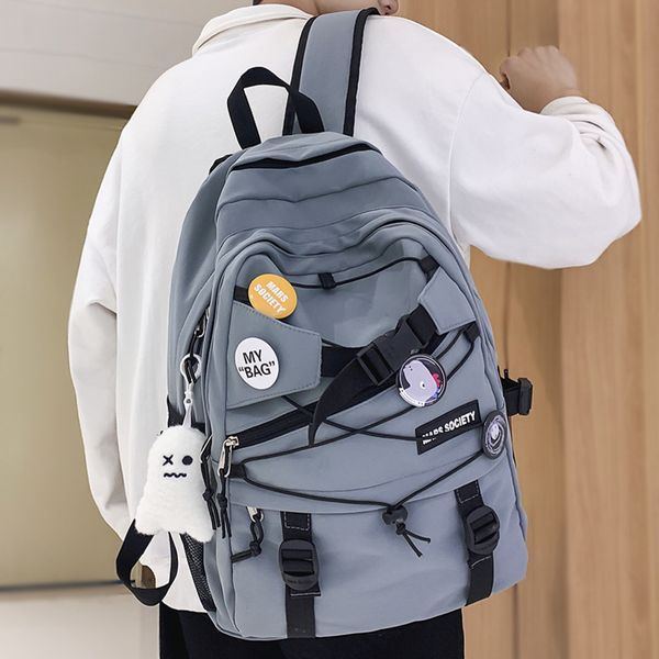 

school bags trendy lady male mesh badge school backpack female nylon college backpack boy girl travel bag fashion men women book lapbags 220