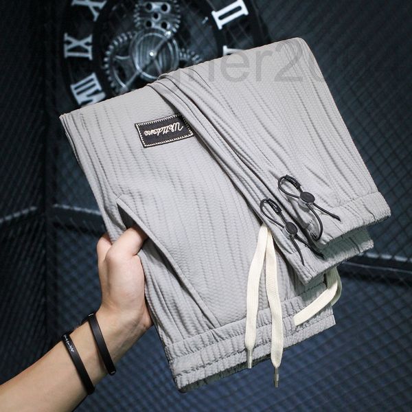 

men's shorts designer ice silk casual pants loose fashion legged nine point summer falling feeling no wrinkle quick drying sports male, White;black
