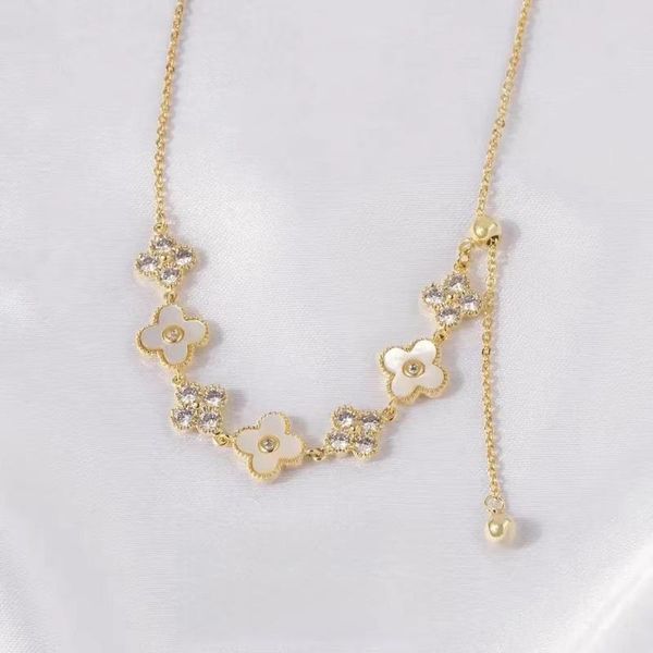 

womans classic high-grade drawable four leaf flower necklace, Golden;silver