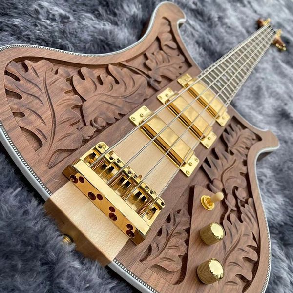 

his is a great electric bass carved from precious walnut exquisitely made and has beautiful timbre it has the me