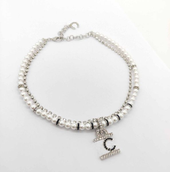 

charm pendant necklace with nature shell beads and black diamond in platinum color have box stamp ps7970, Golden