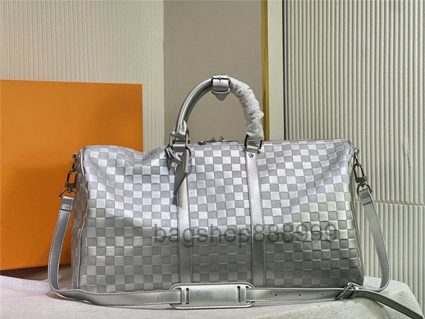 

designer keepall bandouliere 50 travel bag glitter leather featuring the emblematic damier checkerboard and trimmed 2022 quality
