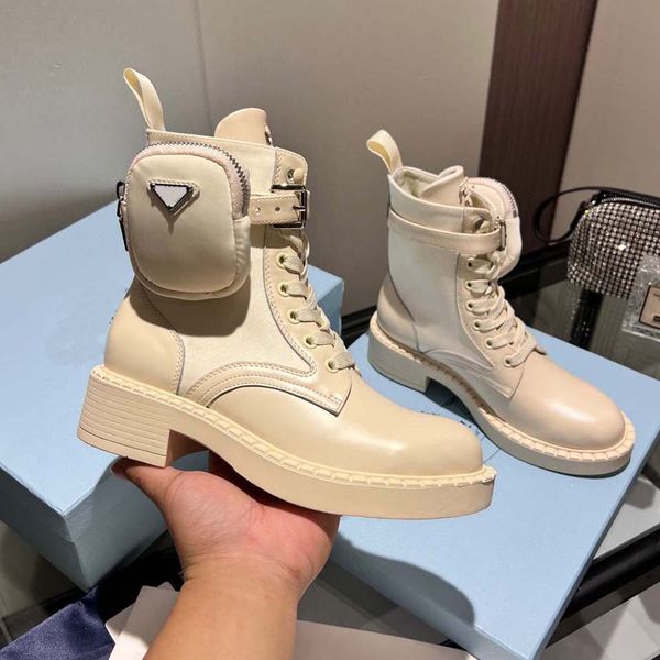 

fashionable womenswear designer rois boots ankle martin boots and nylon boot military inspired combat cloth bag attached to the in black888, Black