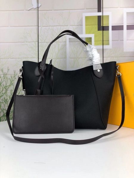 

high qualit leather handbag classic flower bag ladies shopping bags wallets made of genuine leathers material it feels soft