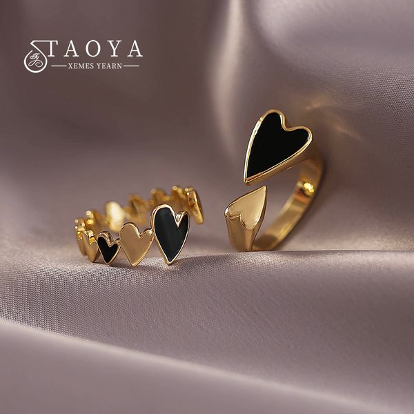 

2022 new creative metal black enamel peach heart stitched gold color rings accessories for women at korean fashion jewelry party, Golden;silver