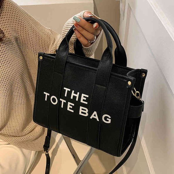 

2022 new version simple diagonal straddle bag literary style letter printed large single shoulder women's purses