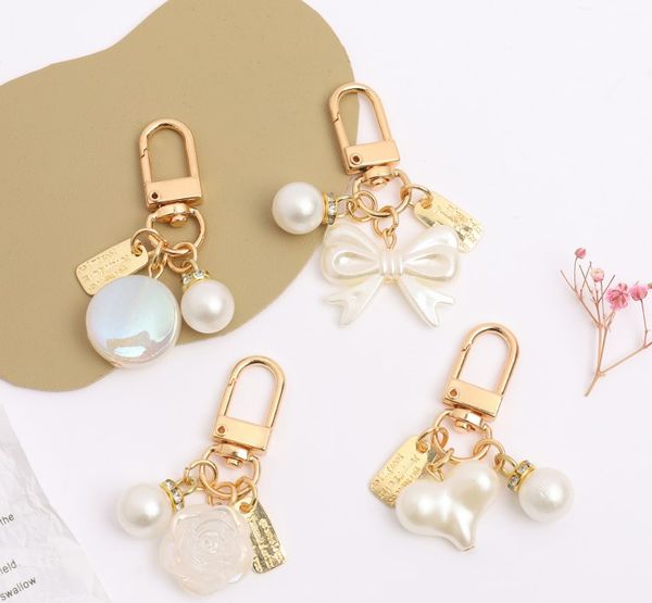 

women's fashion alloy pearl keychain pendant creative bow peach heart bag car keychains jewelry accessories gift lady, Silver