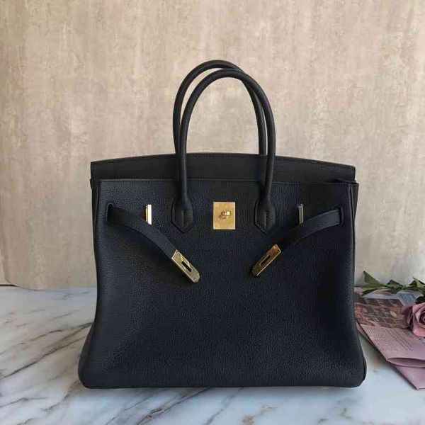 

herme bags classic simple versatile bag lychee pattern togo leather hand lock women's wedding bride