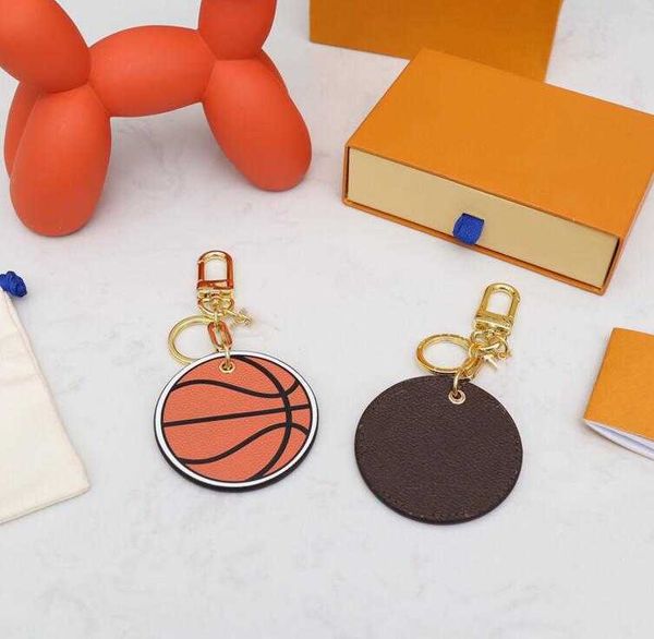 

designer brands luxury fashion keychain letter printing round basketball key chain pu leather alphabet pattern car keys ring pendant, Silver