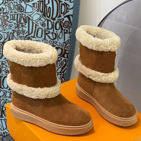

snowdrop flat ankle boots made of suede calfskin shearling comfortable ideal for travel and cold weather upper with brand logo famous design, Black