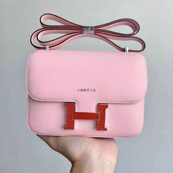 

designer 2022 fashion leather bag new h family swift cowhide pure manual wax thread sewing lizard button stewardess kangkang xiaofang women