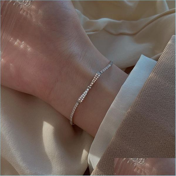 

charm bracelets sier color bowknot bracelet for women shiny zircon wedding party jewelry gifts 5594 q2 drop delivery 2021 bracelets dh dhgm7, Golden;silver