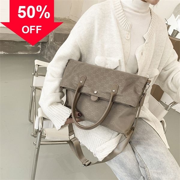 

designer clutch bag evening clutches purse big women's 30-year-old jiang shuying manni new one shoulder msenger canvas portable signatu