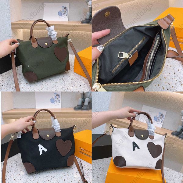 

classic mini shopping bag designer handbags fashion alphabet love eyes patterns person luxury shoulder bags women cross body totes