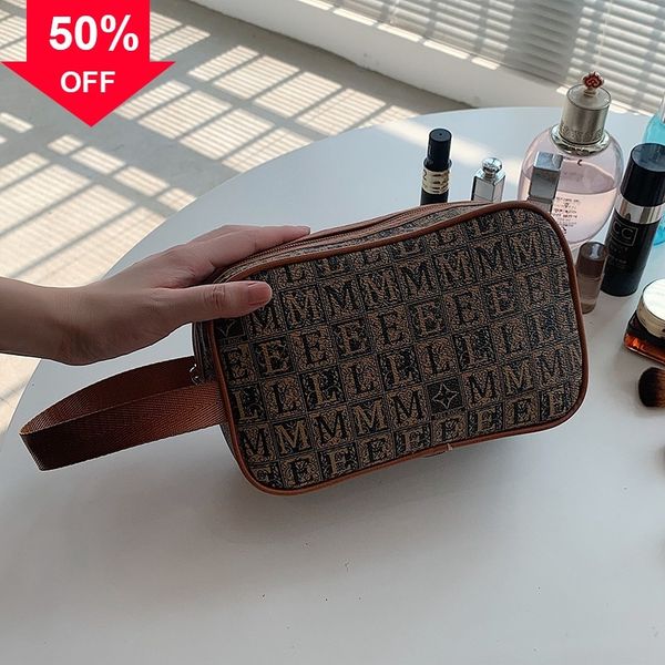 

designer evening bag new shoulder mini hand old flower style net red makeup storage pen hand portable wash