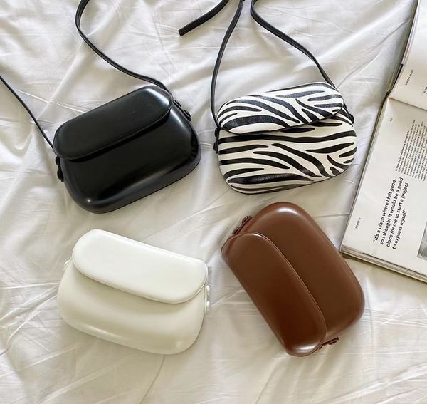 

designer bag 2022 korea zebra pattern horseshoe saddle mini crossbody bags women cell phone small bag